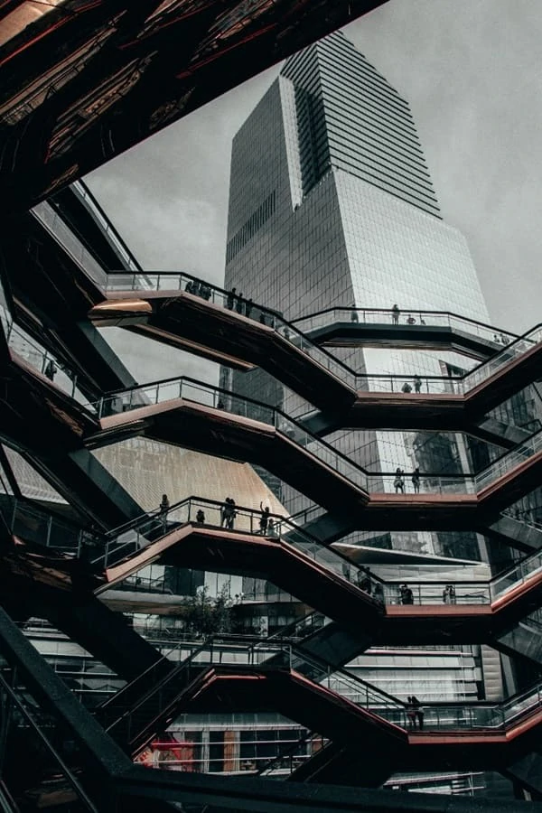 People Enjoy view from high Vessel, NYC